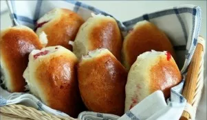 Prepared buns can be lightly buttered and covered with a towel for 10 minutes. After that, muffins with cranberries will be completely re...