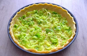 Place the fried leeks on top of the cheese.