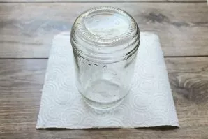 Wash the jar thoroughly in hot water with soda, rinse. Sterilize the jar in any convenient way and boil the lids of the cans over medium ...