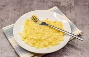 Peel the banana and crush it with a fork.