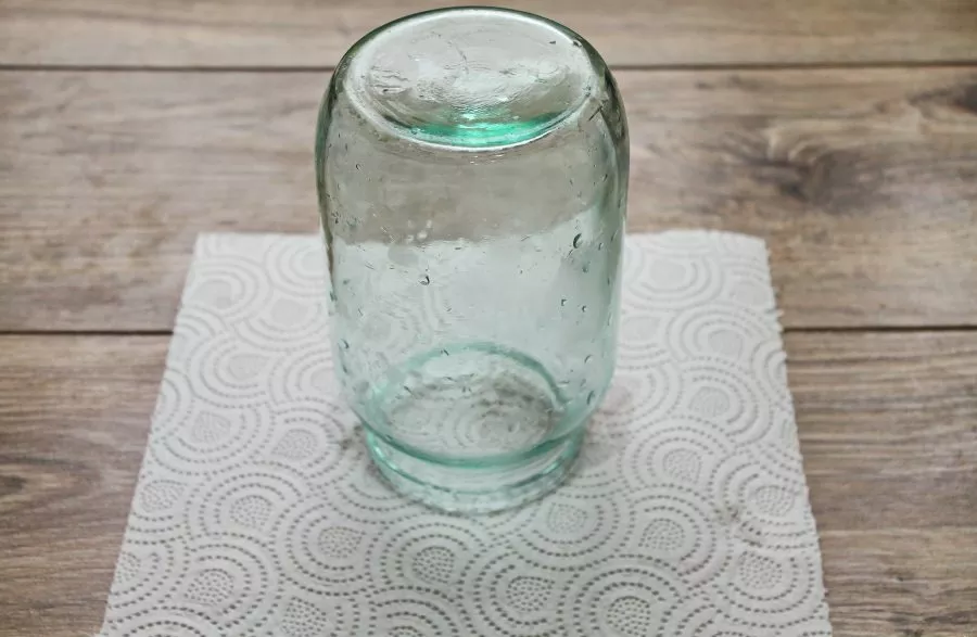 Wash the one-liter jar thoroughly with soda in hot water and sterilize it in any convenient way. Boil the iron lid on medium heat for 5 m...