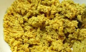 Then add margarine and 2 tablespoons of sugar to the cookies. Mix well until smooth.