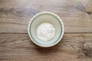 Pour cold cream into a deep bowl and beat until fluffy.