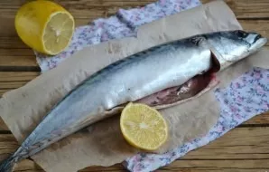 Remove the inside of the mackerel, cut out the gills. Rinse the fish well and dry it with paper towels. Sprinkle the inside and outside o...