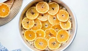 Place clementine circles in the next layer. Leave a few for decoration.