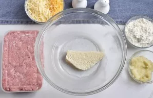 Soak a piece of stale loaf in cold water for a couple of minutes.