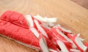 Cut the crab sticks.