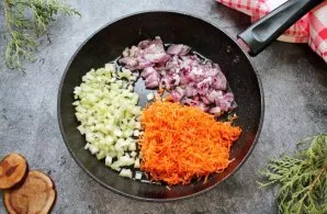 Pour vegetable oil into the pan with a thick bottom and add finely chopped celery. Grate the carrots on a coarse grater, chop the onion f...