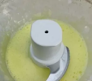 Beat the yolks with sugar and lemon juice until bubbles form.