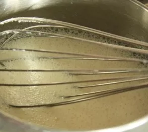 We put the pot on a medium heat and slowly beat until steam comes out of the mass. Do not boil under any circumstances - you need to remo...