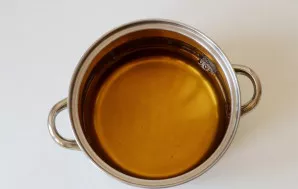 Pour the apple juice into the pot. Bring to a boil.