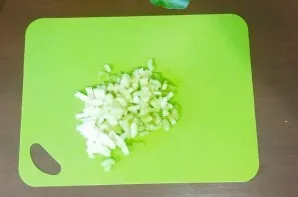 Cut celery into small cubes.
