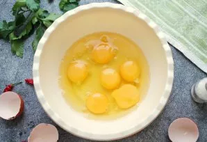 Beat the eggs in a bowl.