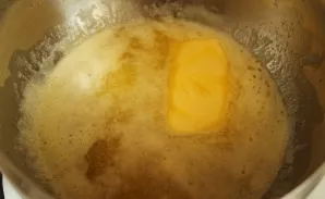 Melt 100 g of butter.
