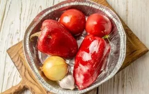 Put sweet peppers, tomatoes, onions and garlic in a baking dish, coat with olive oil. Bake in the oven in grill mode at a temperature of ...