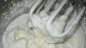 Beat the egg whites with a pinch of salt until peaks are formed.