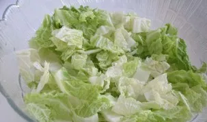 Take the head of Peking cabbage. Cut not too finely. Do not put thick stalks of cabbage, they will only spoil the whole taste of the sala...