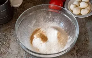 Sift all the flour into a bowl, add salt and sugar. Stir.