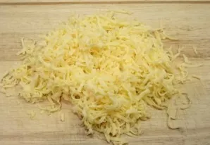 Grate the cheese.