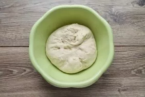 Add fresh yeast, salt, sugar to warm water and mix until smooth. Pour in the vegetable oil, beat the egg and mix everything again. In the...