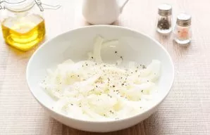 Peel and wash the onion, cut into half rings. Then transfer the onion to a bowl, add vinegar and water, salt and pepper, sugar. Stir and ...