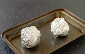 Rinse the beets, dry them and wrap them in foil. Bake at a temperature of 200 degrees until tender. After cooking, let the beets cool, th...