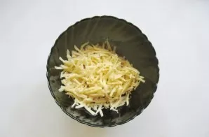 Grate the cheese and put in a bowl with turkey.