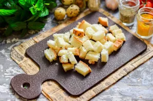 Cut the baguette into cubes, heat the pan, add a little vegetable oil. Fry the cubes of the baguette for a couple of minutes, season with...