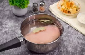 Put the chicken fillet in a saucepan, pour water and season with bay leaf. Boil the fillet for 25-30 minutes until cooked. Ready broth ca...