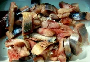 Then cut the fish into strips.