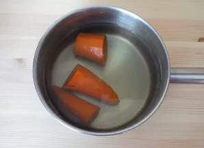 Boil the peeled carrots until tender.