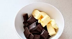 Place the chocolate and butter in a deep bowl in a water bath.