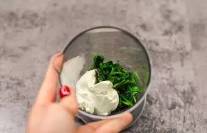 Carefully beat the eggs, separate the whites from the yolks. Put the yolks in a bowl or blender. Fry the spinach in a pan or you can use ...