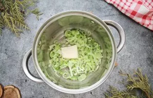 Cut the leek into half rings and put in a saucepan with a thick bottom. Put butter in it and put on medium heat. Let the butter melt and,...