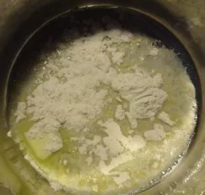 Add flour to the melted butter.