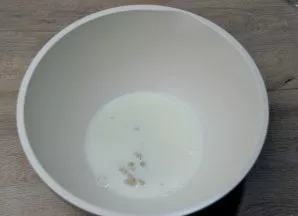 Dissolve the yeast in warm milk.