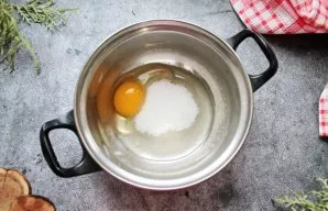 Beat the egg and sugar into a fluffy, light mass.