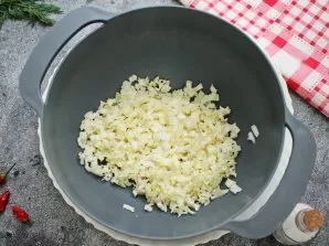 Cut the Peking cabbage into small cubes and put in a salad bowl.