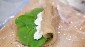 Rub in a little salt and pepper to taste. Put a handful of rukola and cheese on top.