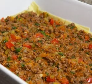 Then spread about a third of the filling.