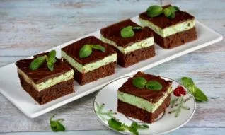 Serve brownie with mint, decorated with fresh mint leaves. This dessert goes well with a cup of coffee.