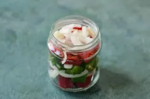 Put the prepared ingredients in a clean, sterilized jar.