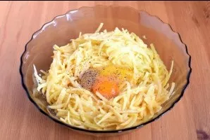 Add eggs, salt and pepper to taste. Add flour and mix well.