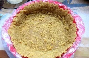 The resulting mass will be the basis of our cake. Put it in a spring tin with high edges. If you dont have one, it doesnt matter. We take...