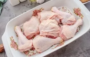 Put the prepared chicken in a baking dish.