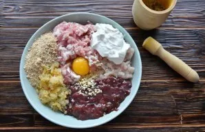 Chop the fillet of pork and chicken breast with a knife or grind in a meat grinder with a large grate. Cut the liver into not too small p...