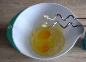 Add 2 eggs to the butter mixture, beat for another 3-5 minutes.