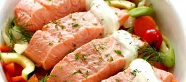 Take a baking dish. Put vegetables in it. Put the pickled fish on top. Pour in the remaining marinade juice. Squeeze sour cream on top of...