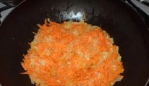 Add carrots to the onions in the pan, fry for about 5 minutes. You can cover the pan with a lid.