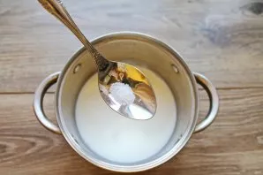 Add salt to the milk.